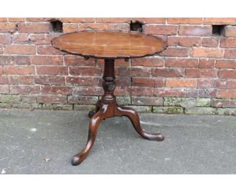 A 19TH CENTURY MAHOGANY TILT TOP CHIPPENDALE STYLE TABLE, the shaped top with moulded detail to the edge, original tilt top m