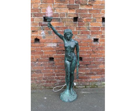 A CONTEMPORARY FLOORSTANDING NUDE MAIDEN ELECTRIC LAMP, holding a torch aloft, standing on a rocky outcrop, H 171 cm