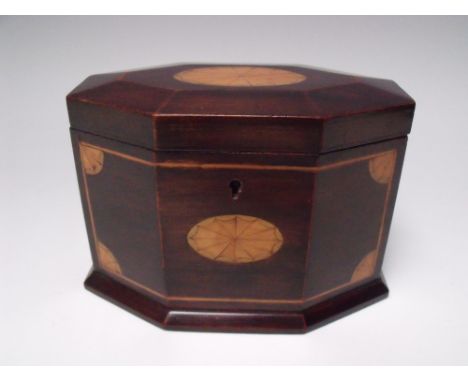 A 19TH CENTURY MAHOGANY OCTAGONAL TEA CADDY, with oval satinwood inlaid detail to the hinged lid, similar inlaid detail to th