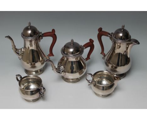 A HALLMARKED SILVER FIVE PIECE TEA &amp; COFFEE SERVICE - BIRMINGHAM 1973, consisting of teapot, coffee pot, hot water jug, c