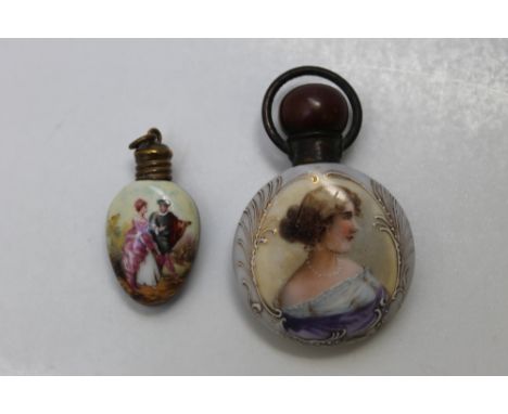 TWO SMALL CONTINENTAL PORCELAIN SCENT BOTTLES, with base metal fittings, the larger of circular form, with a gilt framed port