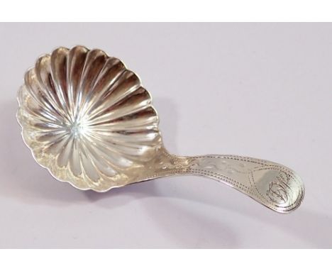 A silver caddy spoon, Birmingham 1800 by Thomas Willmore with fluted bowl and bright cut handle 
