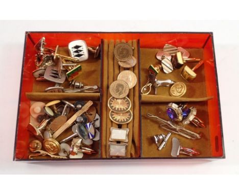 A quantity of cufflinks, tie pins etc. 