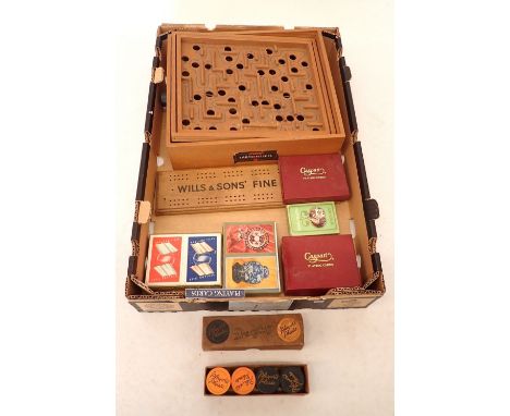 A collection of vintage games including Brio wooden labyrinth maze game, Players Please draughts, Wills and Son's Fine Shagg 