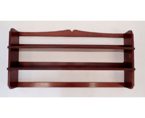 An Edwardian mahogany wall shelf with  85cm wide 