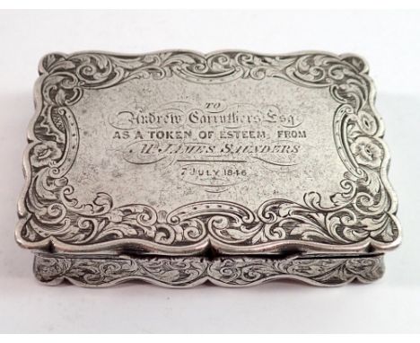 A silver snuff box, Birmingham 1843 by Nathaniel Mills, with engraved presentation of Esteem to the lid and scrollwork decora