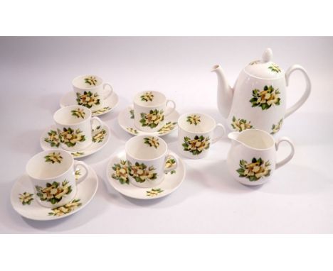 A Shelley vintage tea service printed yellow flowers comprising six cups and five saucers and milk jug 