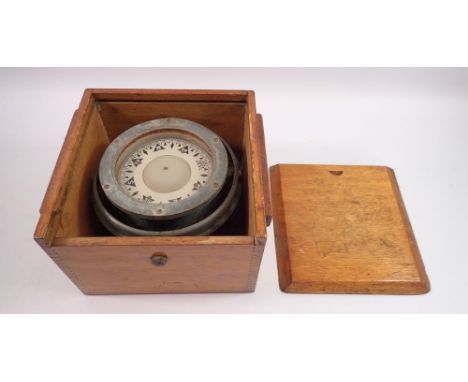 A Sestrel ships gimbal compass in oak case 