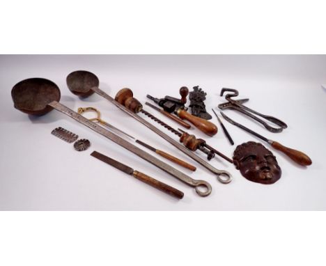 A box of antique engineer tools including riveting drill and two lead casting ladles 