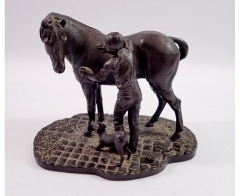 A bronze finish horse and girl groom group 