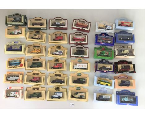 Quantity of mixed boxed vehicles including days Gone, Promotors, H Samuels, Brannigans, Rowntrees jelly, Vintage, Tetley, Joh