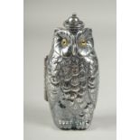A silver plated owl double sovereign holder, 6cm.