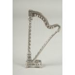A miniature silver harp, 5.5cm.