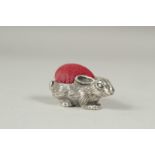 A silver rabbit pin cushion, 3.5cm.