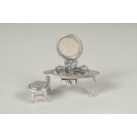 A miniature silver dressing table, 3cm.