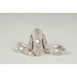 A silver opal set ring and earrings in a box.
