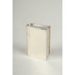 A novelty silver book pill box.