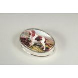 A small silver oval pill box, the lid with an enamel of a spaniel, 3.5cm.
