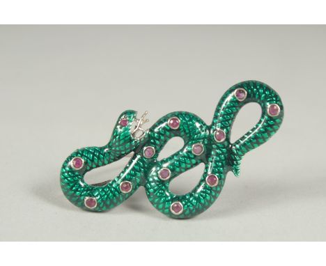 A silver ruby and enamel snake brooch or pendant in a box.