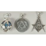 Three various silver Masonic fobs.