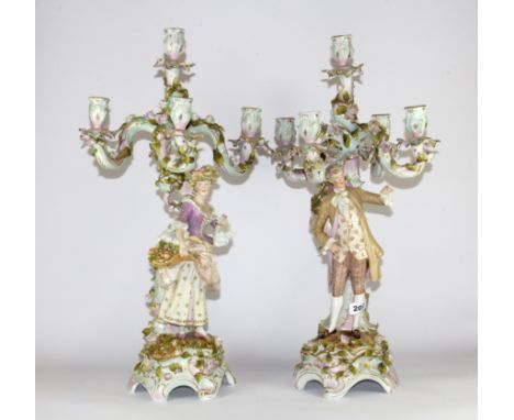 A pair of large 19th Century German porcelain figural candelabra, H. 60cm.