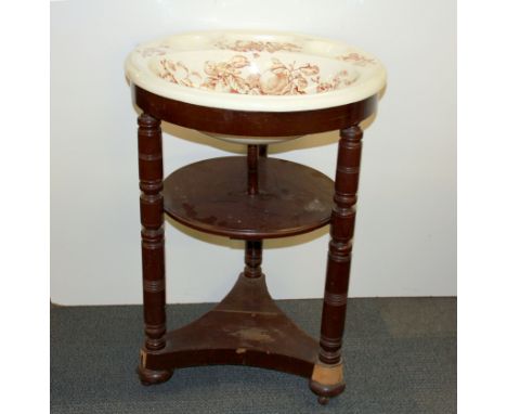 An Edwardian wash basin and stand, Dia. 60cm, H. 83cm.