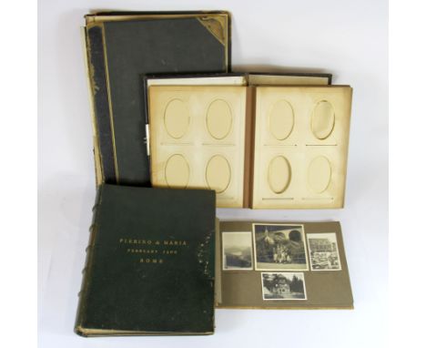 Four mixed vintage photograph albums (mostly empty).