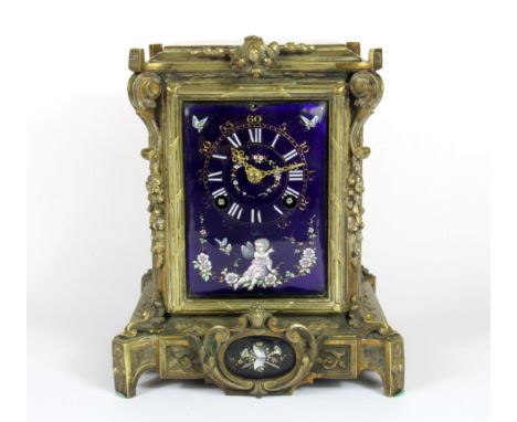 A superb Limoges enamelled and brass mantle clock with striking movement, H. 20cm.