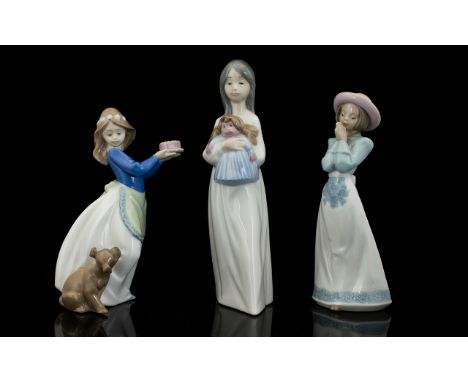 Nao by Lladro Figures ( 3 ) In Total. Comprises 1/ ' A New Doll ' 1117 Figurine. Approx 9.5 Inches High, Full Stamps to Base,