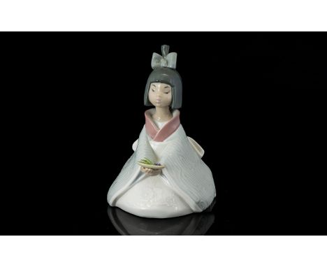 Nao by Lladro Flowers of the Orient 1270 Lady Figurine, She Is In An Sitting Position, Holding a Small Plate of Food, Full St