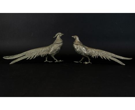 A Pair Of Pewter Place Card/Menu Holders In The Form Of Pheasants Vintage table decorations in the form of a pheasant and hen