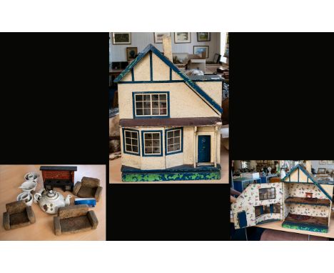 Vintage Doll House With Miniature Parts To Include Sofa and Cooker. Together With A Childrens Tea Set.