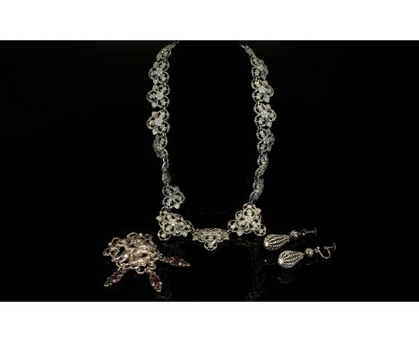 A Collection Of Pewter Tone Vintage Costume Jewellery An unusual collection of three items to include ornate 1940's collar ne