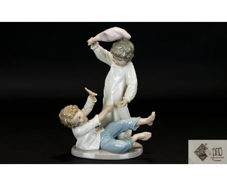 Nao by Lladro Porcelain Figurine - Titled ' Boys Pillow Fight ' Model No 0281, Sculptor Salvador Furio. Issued 1992 - Retired