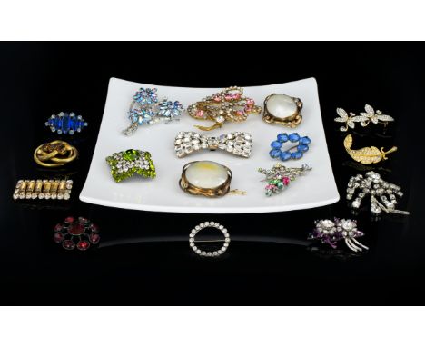 A Large Collection Of Vintage Paste Set Statement Brooches 17 items in total to include three antique gold tone and mother of