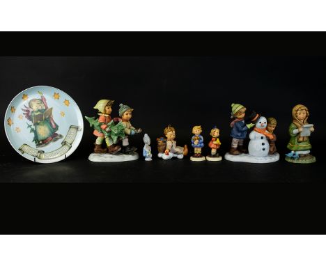 Hummel Goebel Figurines ( 3 ) In Total. Comprises 1/ Crowning Touch BH 82. Approx 7 Inches by 6 Inches. 2/ Tree Trimming Time