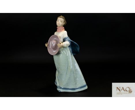 Nao by Lladro Figurine - Titled ' Windy Autumn Day ' Model Num 1295. 12.5 Inches - 33 cm Tall. 1st Quality & Mint Condition. 