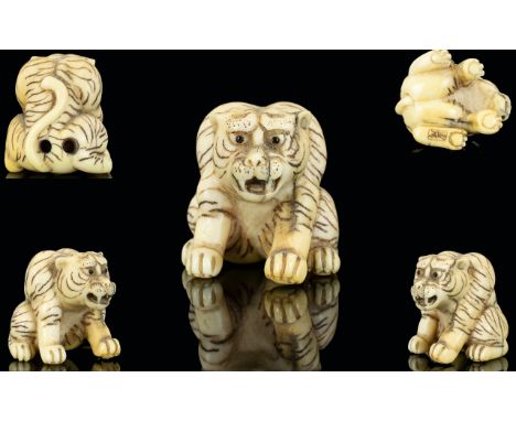 Japanese - 19th Century Superb Quality and Signed Carved Ivory Netsuke, In The Form of a Hunchback Tiger. c. Meiji Period. Si