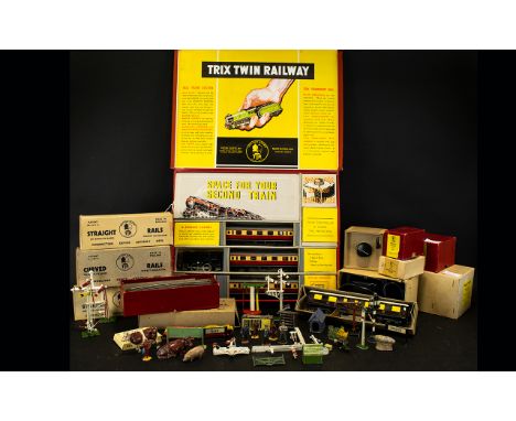 Trix Twin Train Set In Fitted Box With A Quantity Of Accessories 00 gauge trainset in good order, with all components intact.