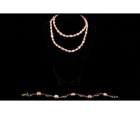 A Coral Necklace And Bracelet two items in total, the first, a delicate coral collar style necklace strung with multiple cora