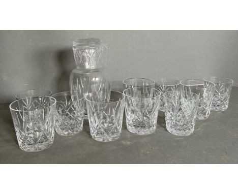 Ten cut glass tumblers and a cut glass decanter 
