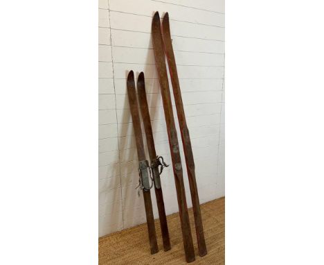 Two pairs of vintage wooden skis 