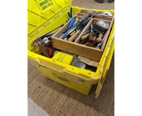 A crate of various tools 