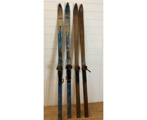 Two pairs of vintage wooden skis 