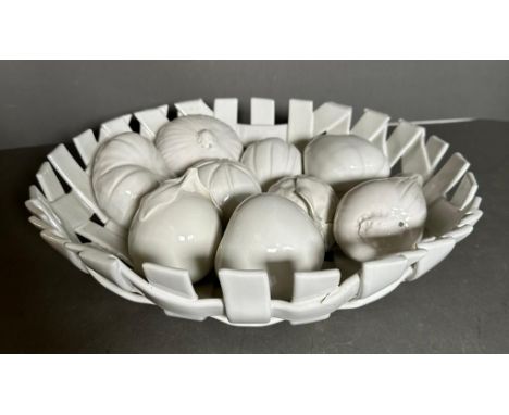A white ceramic lattice work bowl with a selection of ceramic fruit AF 