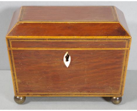 Regency casuarina sarcophagus shape caddy boxwood strung and inlaid, matching interior with lined ivory knobs, c1810, 18cm x 