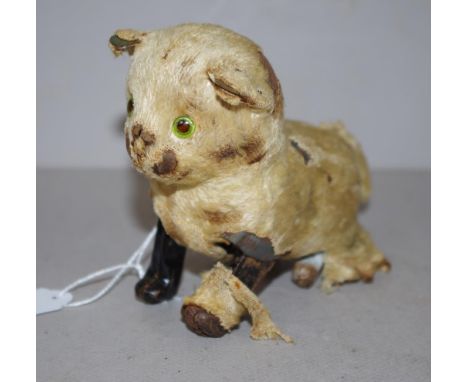 Vintage Japanese clockwork walking cat toy wind-up mechanism, which appears operational. Worn condition to fabric covering of