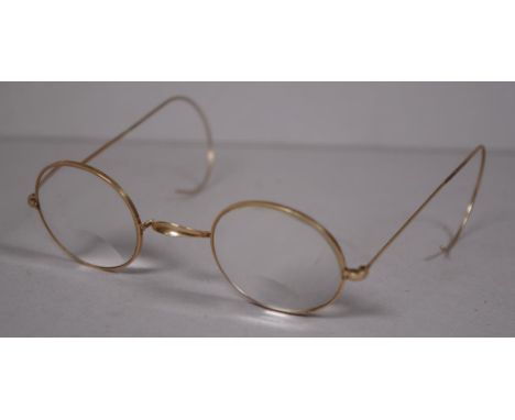 Vintage pair gold plated spectacles marked ' Algha'  to nose piece, with flexible side arms.