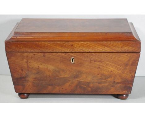 Large George III flame mahogany caddy, the interior with matching & strung canisters and bowl, with heavy lion ring side hand