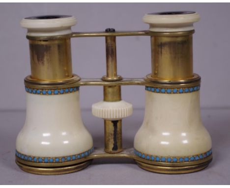 Antique pair ivory cased opera glasses ivory on a brass frame, with beaded turquoise decoration. Eyepieces are marked  'L. Ca